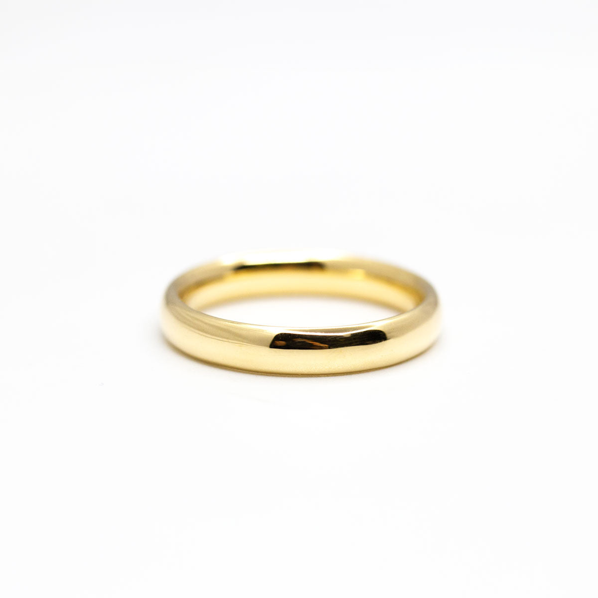 Alliance de mariage homme Ulysse bombée luxe 3,5 mm entièrement arrondie et confortable, fini lisse et brillant réalisé artisanalement à Paris en or jaune recyclé 18 carats