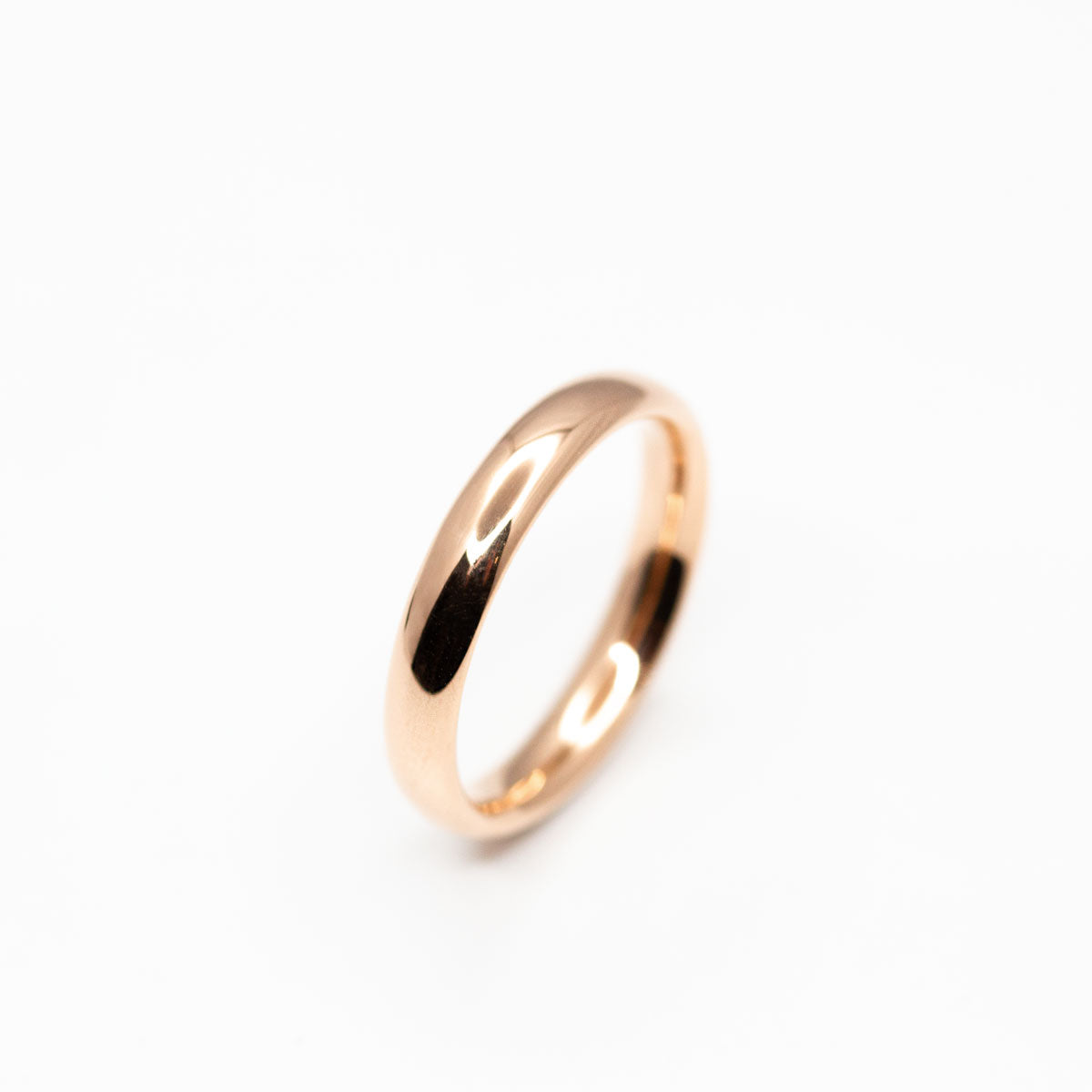 Bague de mariage homme Ulysse bombée luxe 3,5 mm entièrement arrondie et confortable, fini lisse et brillant réalisé artisanalement à Paris en or rouge recyclé 18 carats