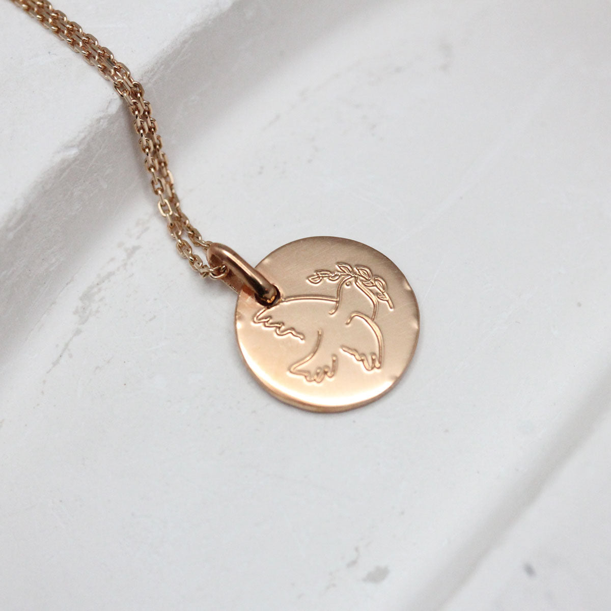 Médaille en or rouge, gravée d'une colombe Paris Lyon